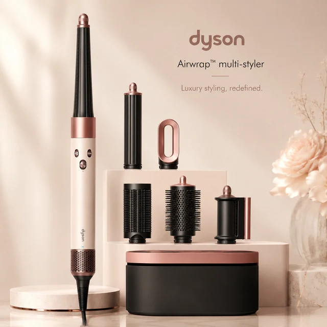 The Dyson Airwrap i.d. in Ceramic Pink and Rose Gold with its six attachments and its case