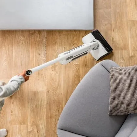 Rowenta X-Clean 10 laid flat under a sofa